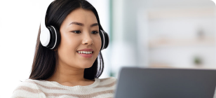 A woman about to take the learning style quiz on her laptop